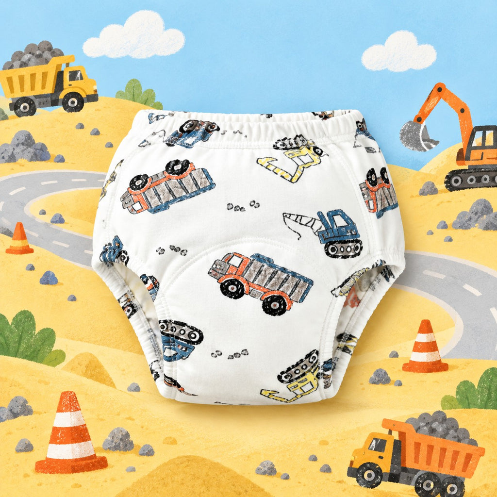 Brave Bottoms training underwear in the Trucks print: dump trucks, diggers and cranes on white, on a construction-site scene