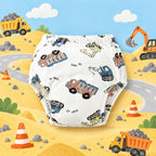 Brave Bottoms training underwear in the Trucks print: dump trucks, diggers and cranes on white, on a construction-site scene